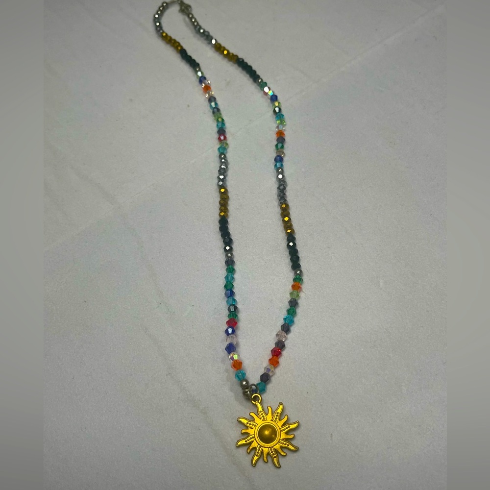 Hand made sparkly beaded necklace with sun pendant